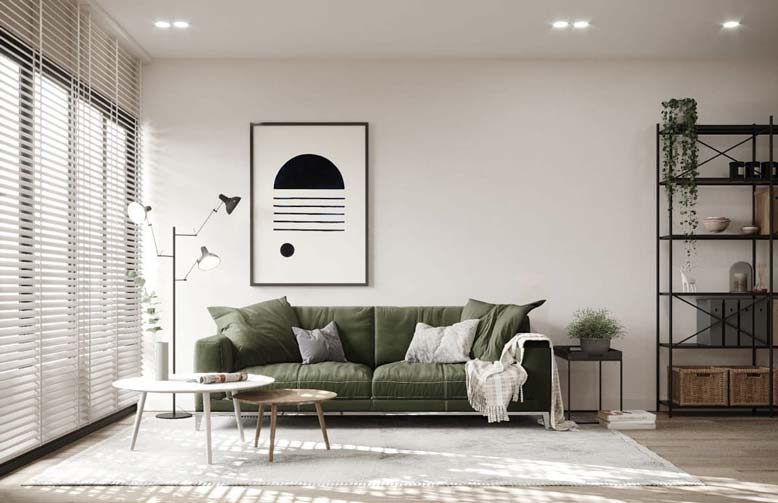 Phòng khách với điểm nhấn màu xanh rêu và khung cửa sổ lớn đặc trưng của phong cách Scandinavian