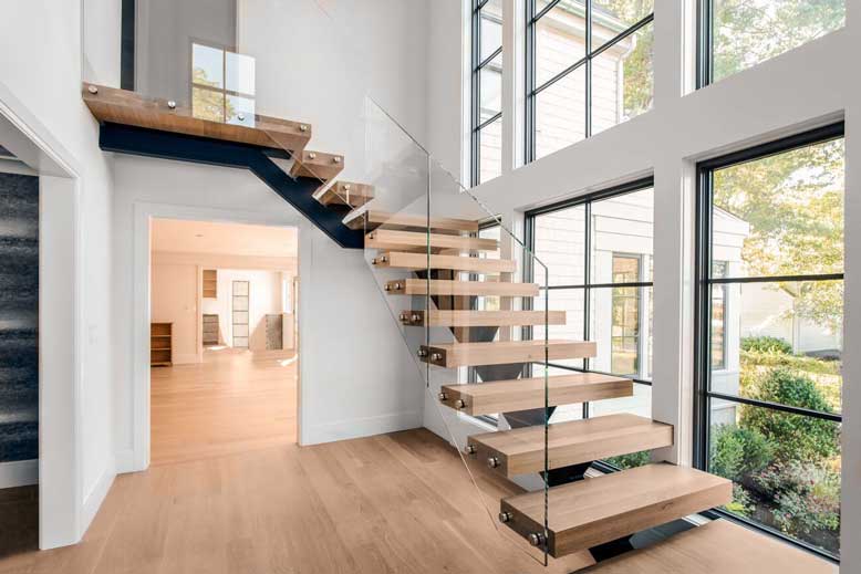 Cầu thang thời thượng:
Cầu thang được thiết kế hiện đại, tạo nên vẻ đẹp tuyệt vời cho không gian nhà bạn. Sự kết hợp hài hòa giữa các chất liệu cao cấp như gỗ tự nhiên, sắt thép và kính cường lực đã tạo nên một cầu thang thời thượng và lôi cuốn.