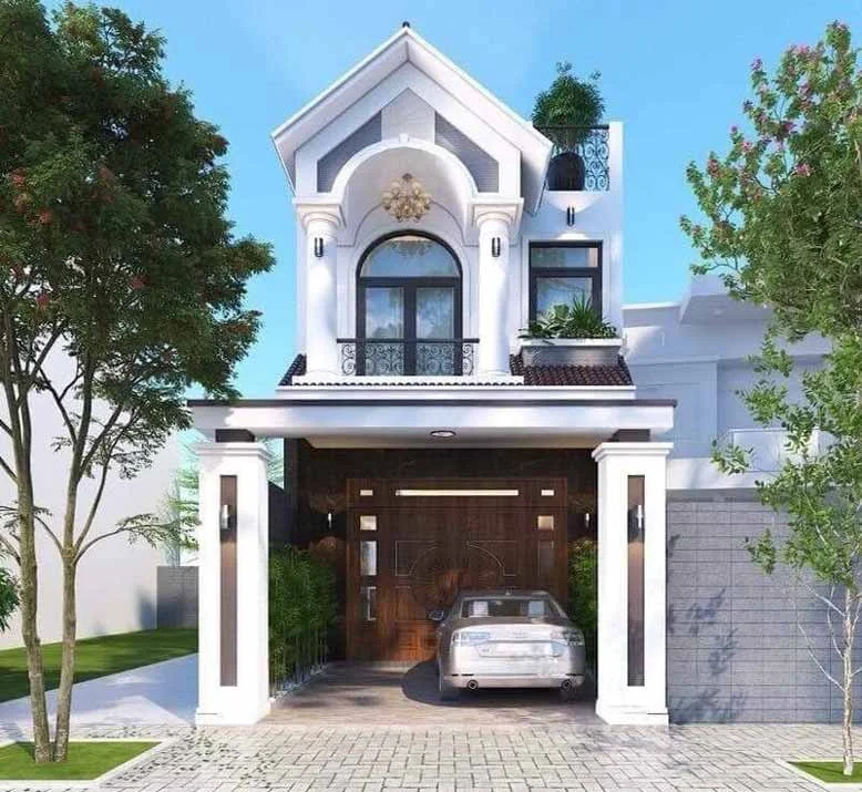 Mẫu nhà phố tân cổ điển 2 tầng với cửa chính được ốp gỗ sang trọng